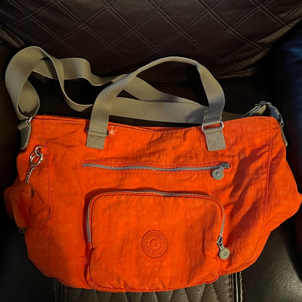 Orange Kipling overnight bag